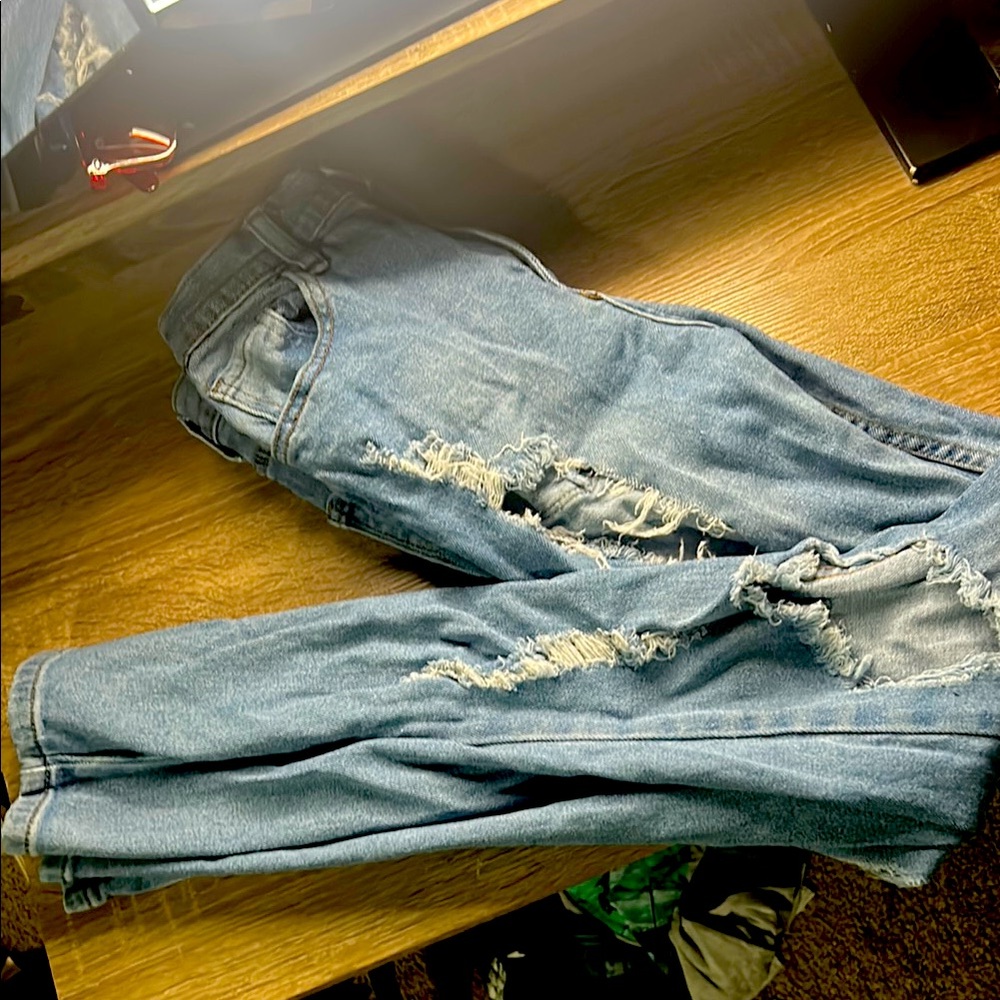 Women’s Distressed Blue Jeans. Wore only a few times. (like new)